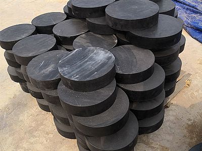 固阳县板式橡胶支座由若干层橡胶片与薄钢板经加压硫化